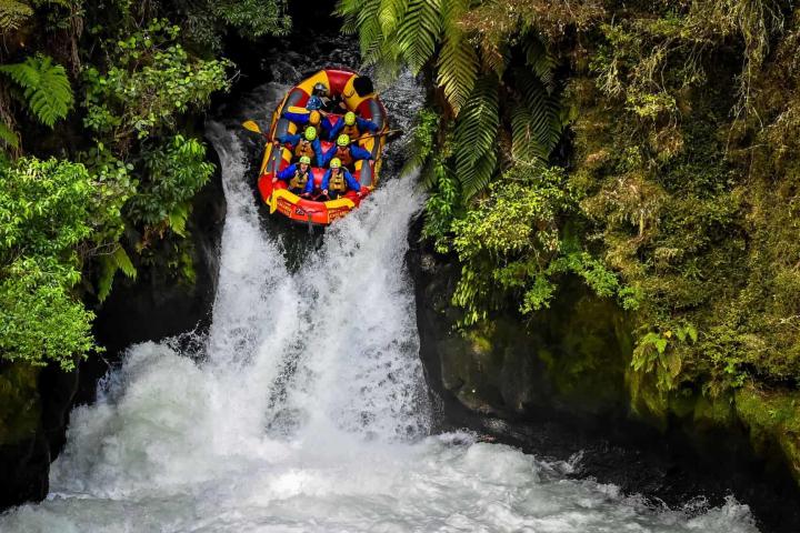 a man riding on the back of a waterfall