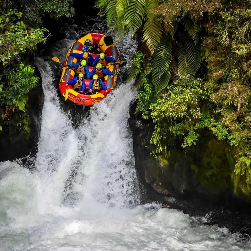a man riding on the back of a waterfall